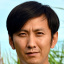 李华