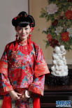 新生代花旦王媛拍攝新年寫真 古典紅裝笑容甜美