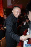 中国电影集团公司董事长韩三平微笑现身观众席