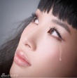 黃圣依黑紗蓬蓬裙拍寫真 流淚露美背我見猶憐