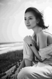 董潔三亞海邊拍公益寫真 大秀香肩顯小女人韻味