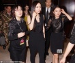 杨幂穿黑色连体裤酷劲十足 获多人护送显大牌