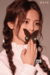 杨超越大片曝光 白色运动服羊角辫造型似精致娃娃