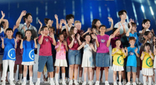 世运会主题曲《万千》创作幕后：词曲作者再度联手 传递团结与希望